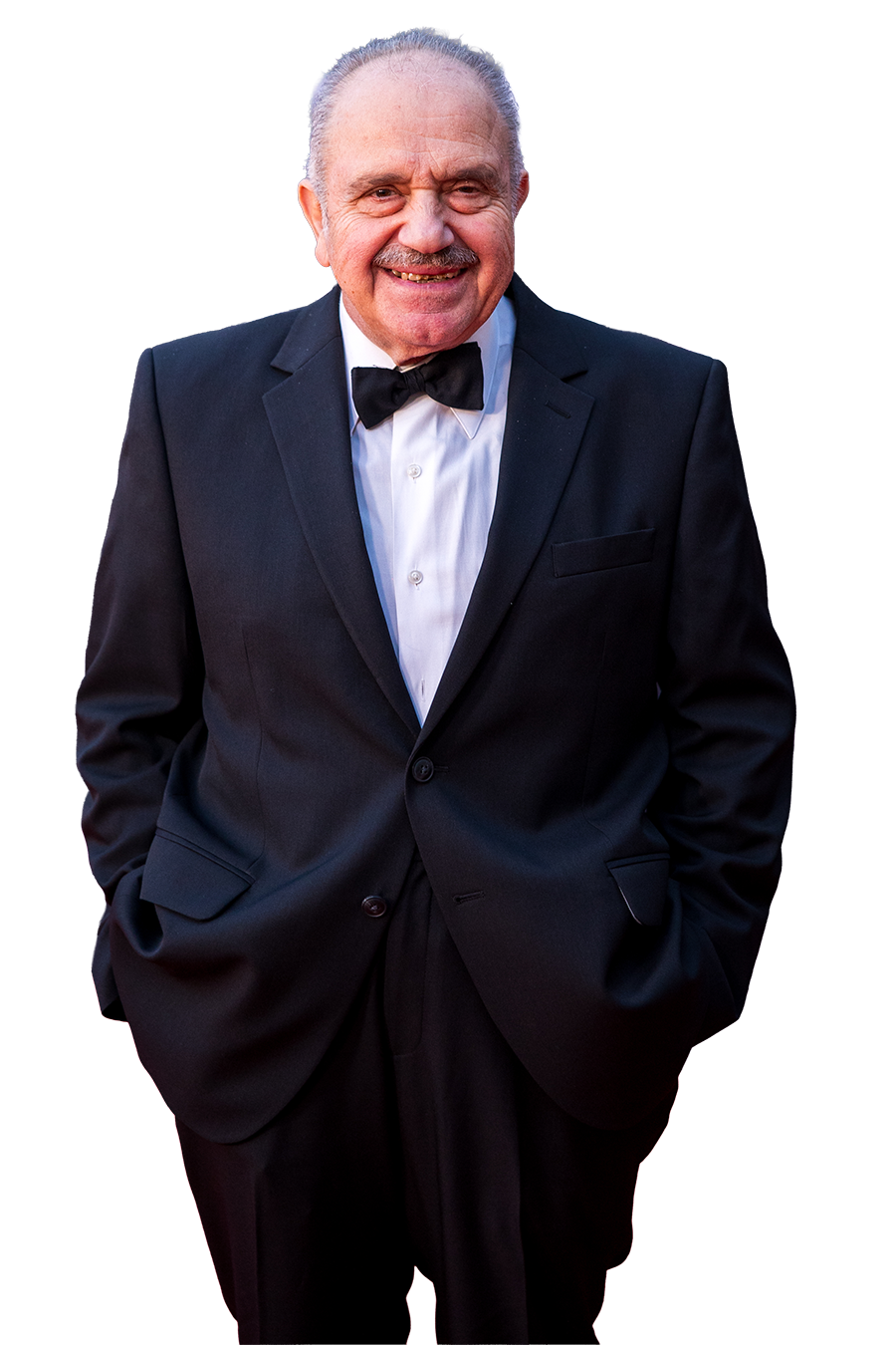 a man in a suit smiling